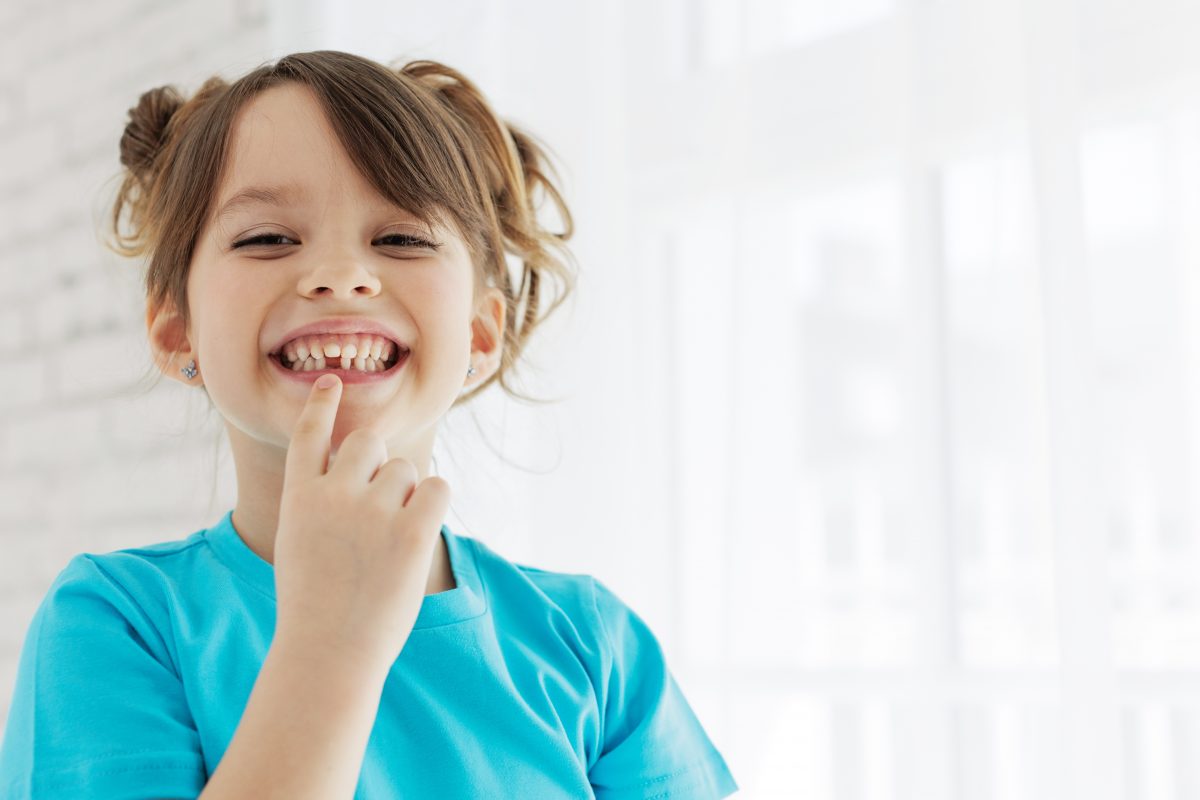 child with teeth gap